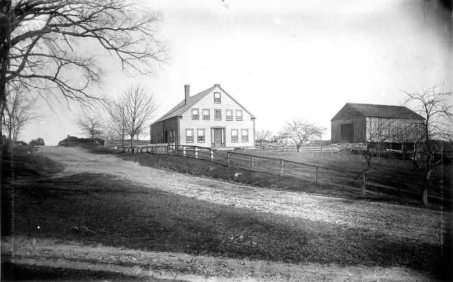 The farm shown was built by Gilbert Alexander in 1830, on land that was originally part of a larger tract of land, granted earlier to the Nesmith family. His brother Samuel  owned an adjoining farm which was also on the original Nesmith grant. Samuel built his buildings in 1854. Nellie Mae, who died in the summer of 1916 was Samuel’s only child. They all descended from Randal Alexander, one of the first 16 settlers of Londonderry.    